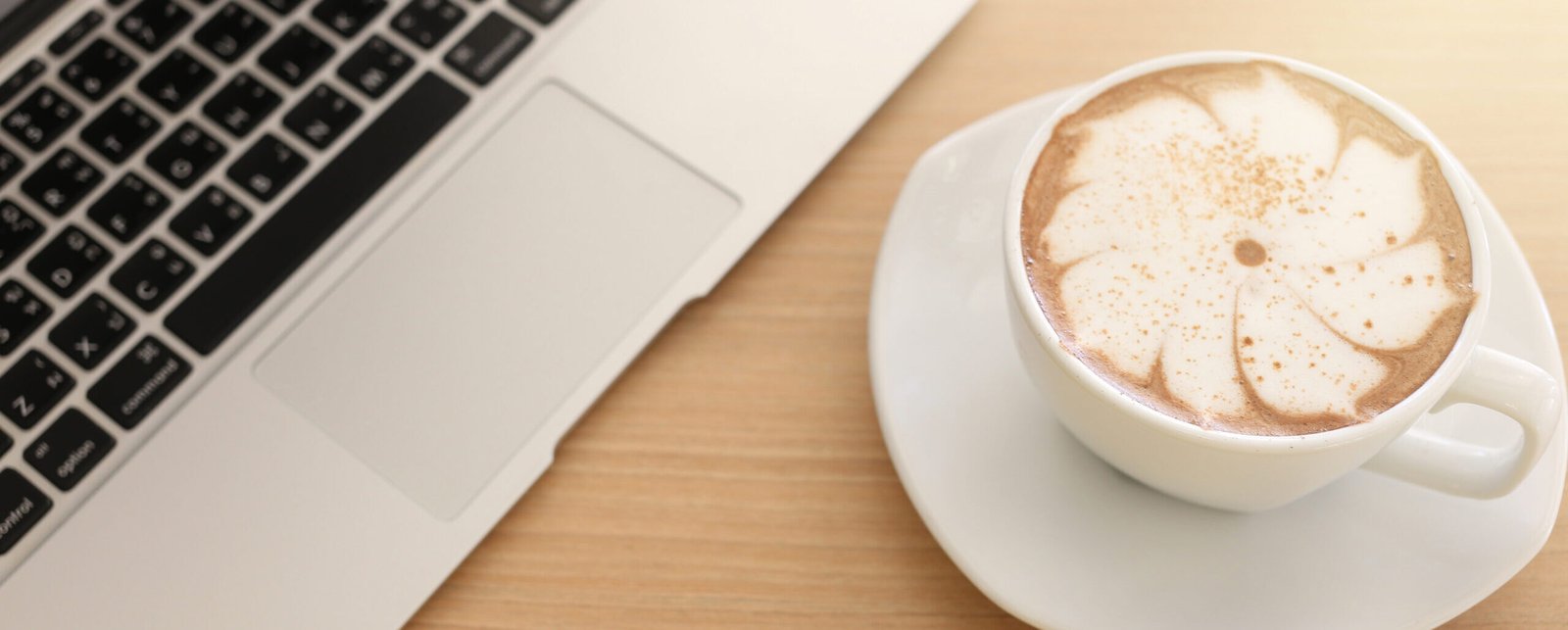 laptop-wooden-table-with-coffee-cup-top-view